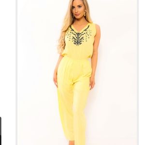 Universal Fashions yellow jumpsuit blue embroidery